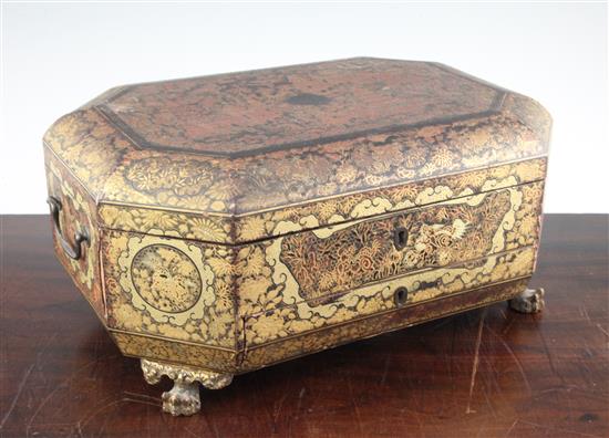 A Chinese export gilt decorated black lacquer sewing box, containing ivory accessories, mid 19th century, 39cm.